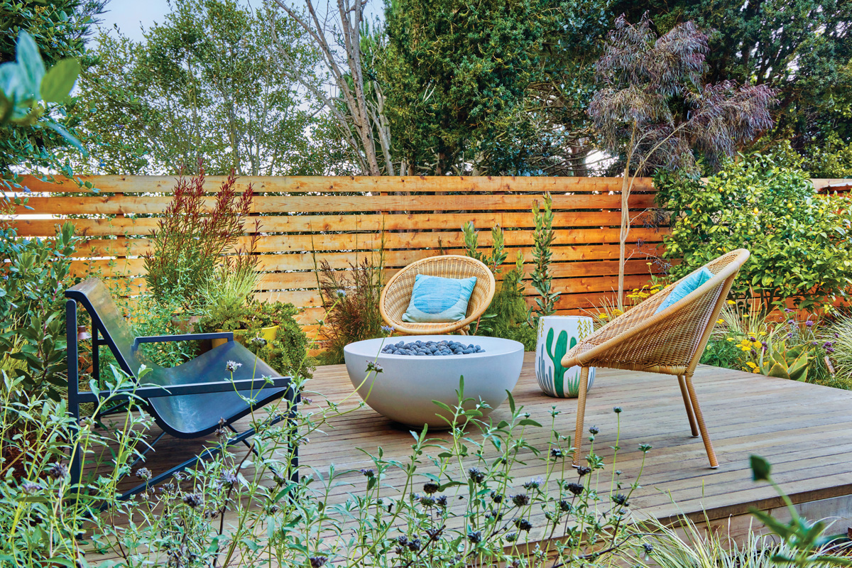 A heated bench and gas fire bowl make for a cozy seating area for cool nights